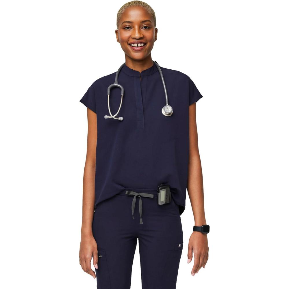 imageFIGS Rafaela Oversized Scrub Tops for Women Mandarin Collar Shirttail Hem 3 Pockets 4Way StretchNavy Blue